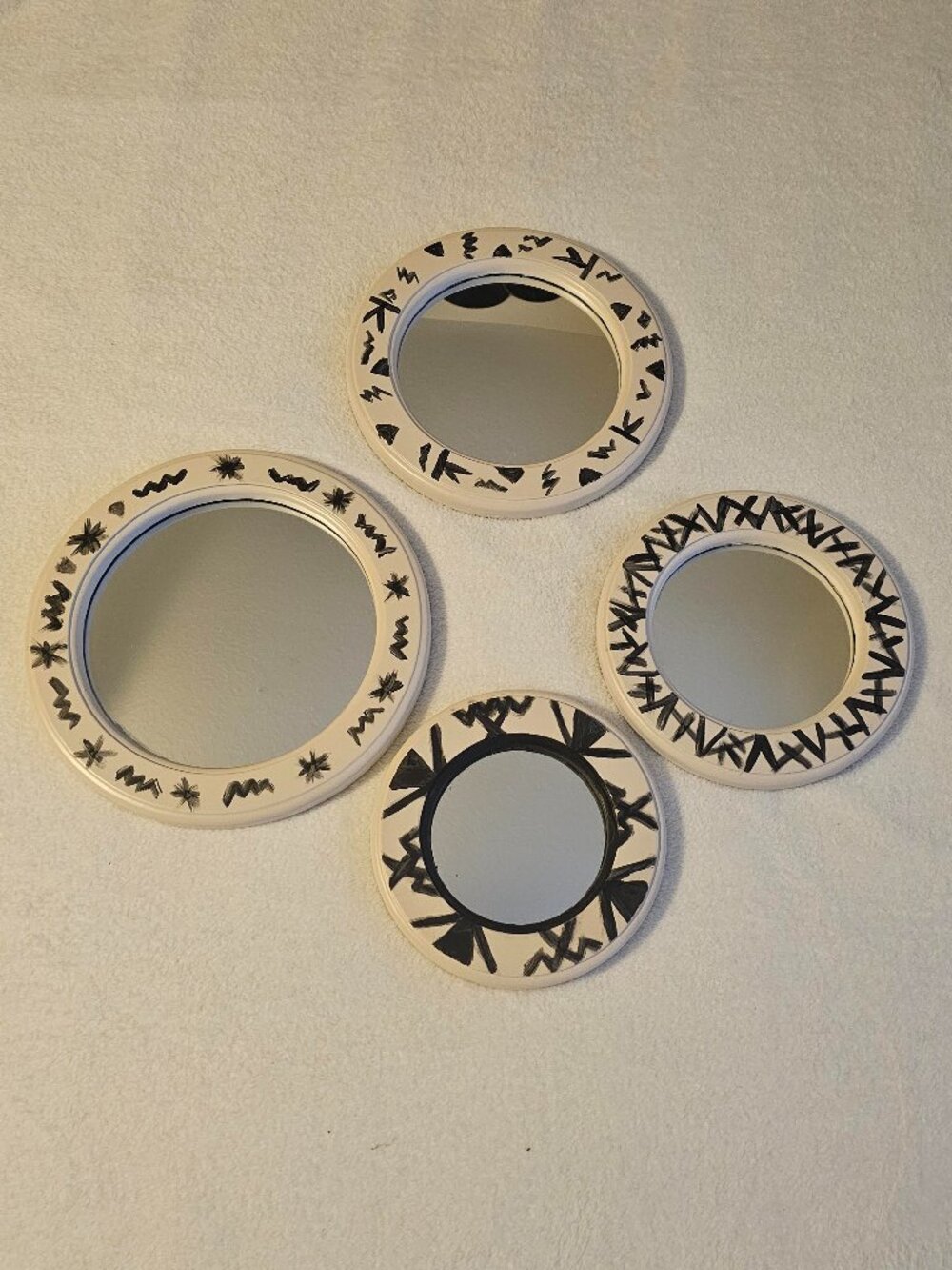 Set of 4 handcrafted bohemian-style round wall mirrors